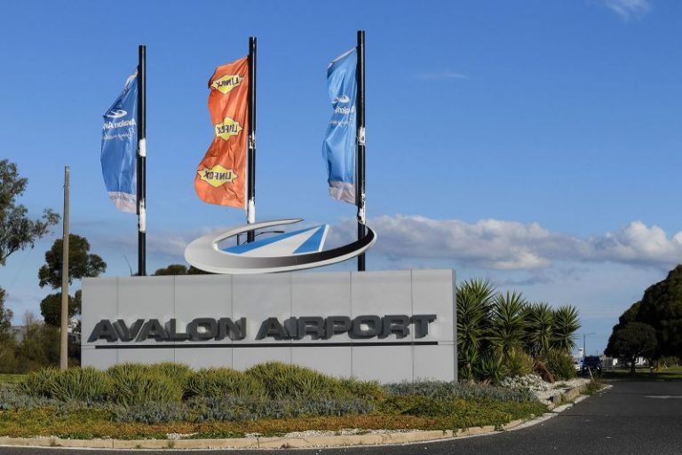 A boy with a loaded shotgun boarded a plane in Australia but was tackled by a former boxer