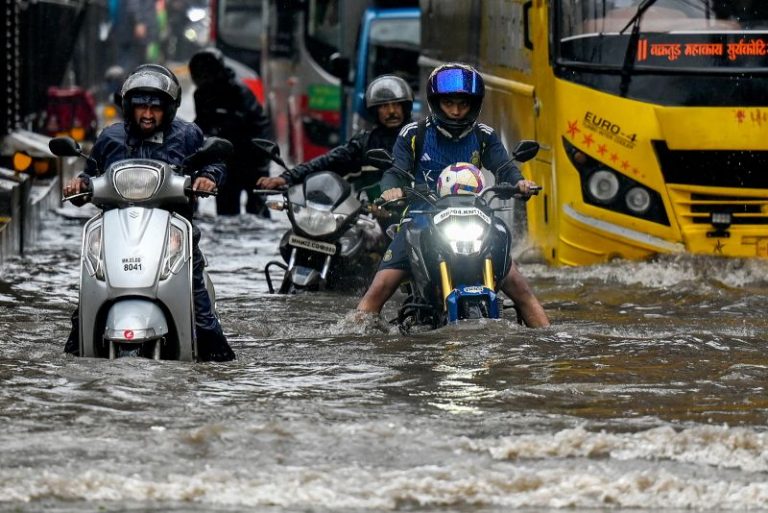 Floods wreak havoc on India’s financial capital as monsoon rains arrive early