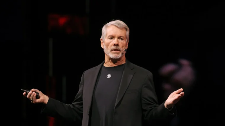 Saylor Frames Bitcoin Dip as Structural Shift to AI…